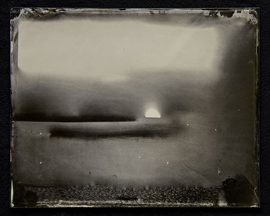 Bright, warm silvers above. Warm undulating greys at center disrupted by brights drops and dark dashes. Dark grey, pebbled texture at bottom.